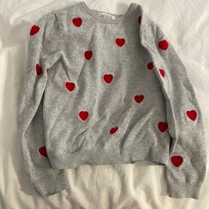 Grey sweater with red hearts